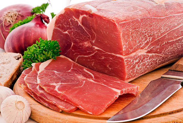 Piece of gammon as closeup on a cutting board